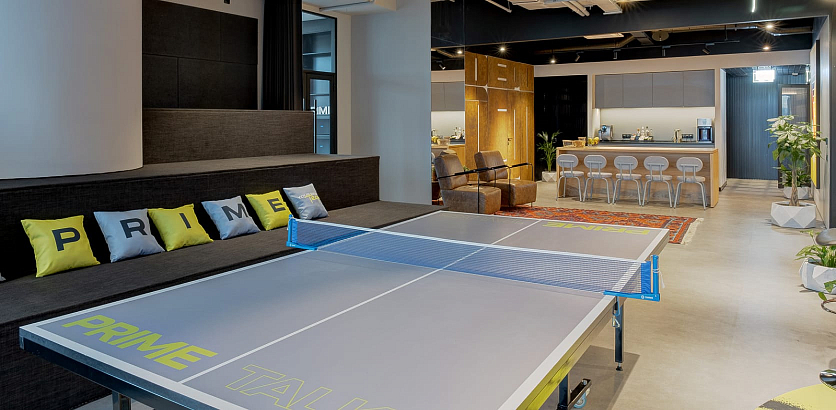 A tennis table where you can have a match with your colleagues between closing deals